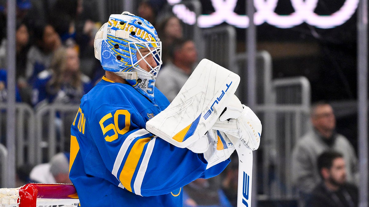 Jordan Binnington looks on during a NHL game