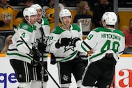 Dallas Stars center Mavrik Bourque (22) is congratulated after scoring a goal against the...