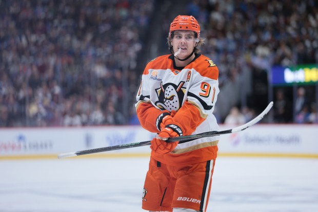 The Ducks’ Leo Carlsson looks on during the first period...
