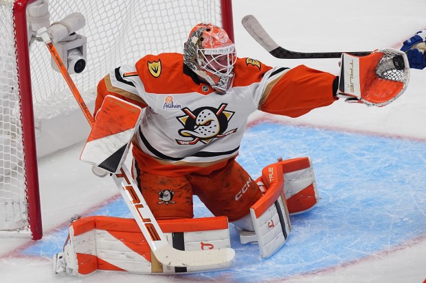 Ducks goaltender Lukas Dostal makes a glove save during the...