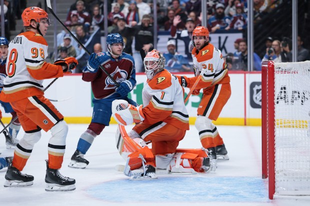Ducks goaltender Lukas Dostal (1) defends the net during the...