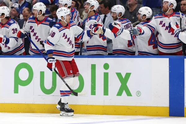 Game-opening barrage propels Rangers to rout of Lightning