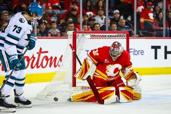 Flames’ Dustin Wolf needs just 16 saves to shut out Sharks