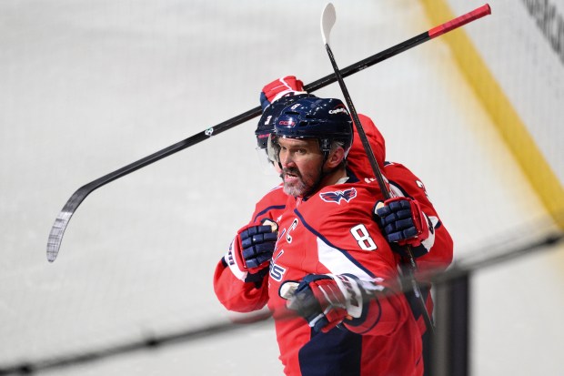 Washington Capitals left wing Alex Ovechkin (8) celebrates his goal...