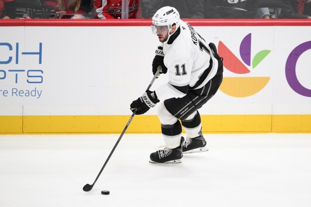 Kings center Anze Kopitar skates with the puck during the...