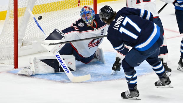 Winnipeg beats Columbus 5-2, as Adam Lowry scores 1st goal after return from surgery