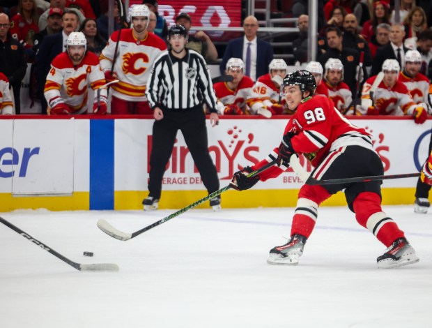 Blackhawks center Connor Bedard (98) shoots on goal during the first period against the Flames on Nov. 18, 2025, at the United Center. (Dominic Di Palermo/Chicago Tribune)