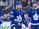 Toronto Maple Leafs' Scott Laughton celebrates with his team after their win against the Utah Mammoth.