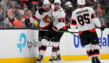CORRECTS TO THIRD PERIOD - Ottawa Senators right wing Drake Batherson, left, is congratulated Senators