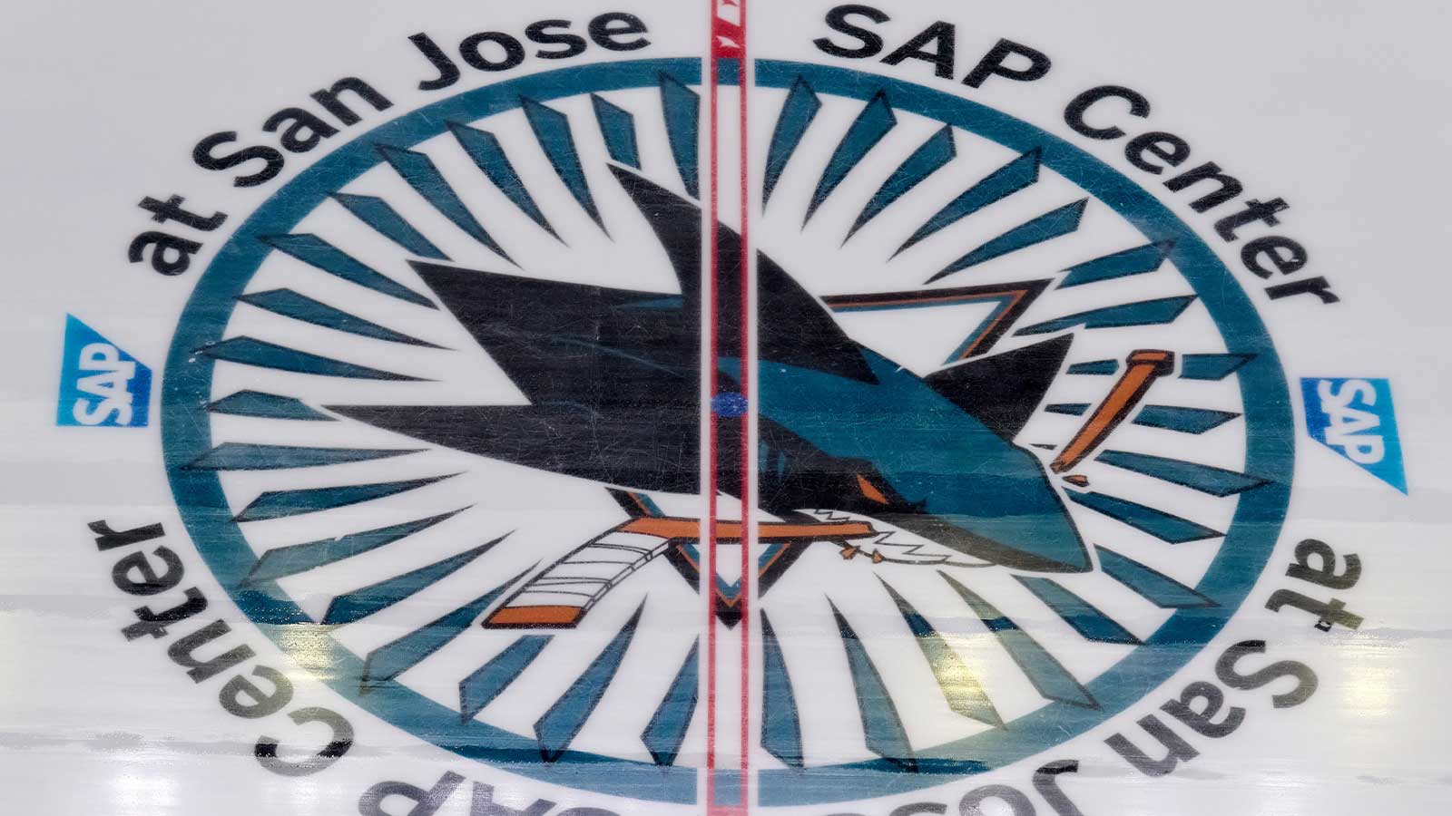 The San Jose Sharks logo at center ice commemorating the 35th anniversary season before a preseason game between the San Jose Sharks and the Anaheim Ducks at SAP Center at San Jose.