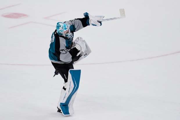 San Jose Sharks goaltender Yaroslav Askarov celebrates after the team’s...
