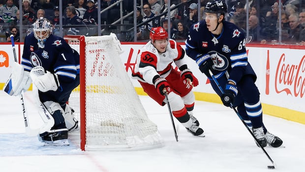 Jets goalie Comrie 'rock solid' despite 4-3 loss to Hurricanes, coach says