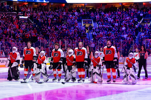 The Philadelphia Flyers honor Bernie Parent, who passed away earlier this year, alongside members of the Ed Snyders