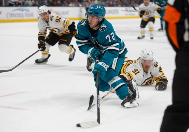 San Jose Sharks’ William Eklund (72) controls the puck against...