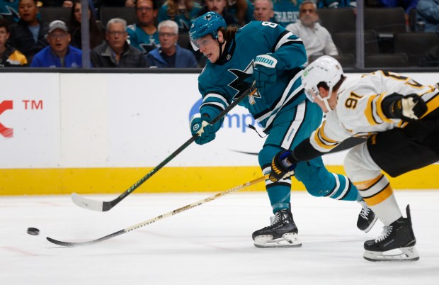 San Jose Sharks’ Adam Gaudette (81) takes a shot against...