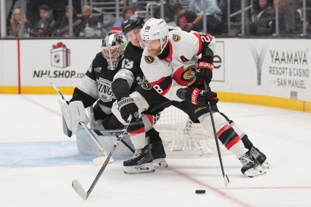 Ottawa Senators right wing Claude Giroux (28) moves the puck...