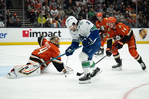Vancouver Canucks right wing Conor Garland (8) scores past Ducks...