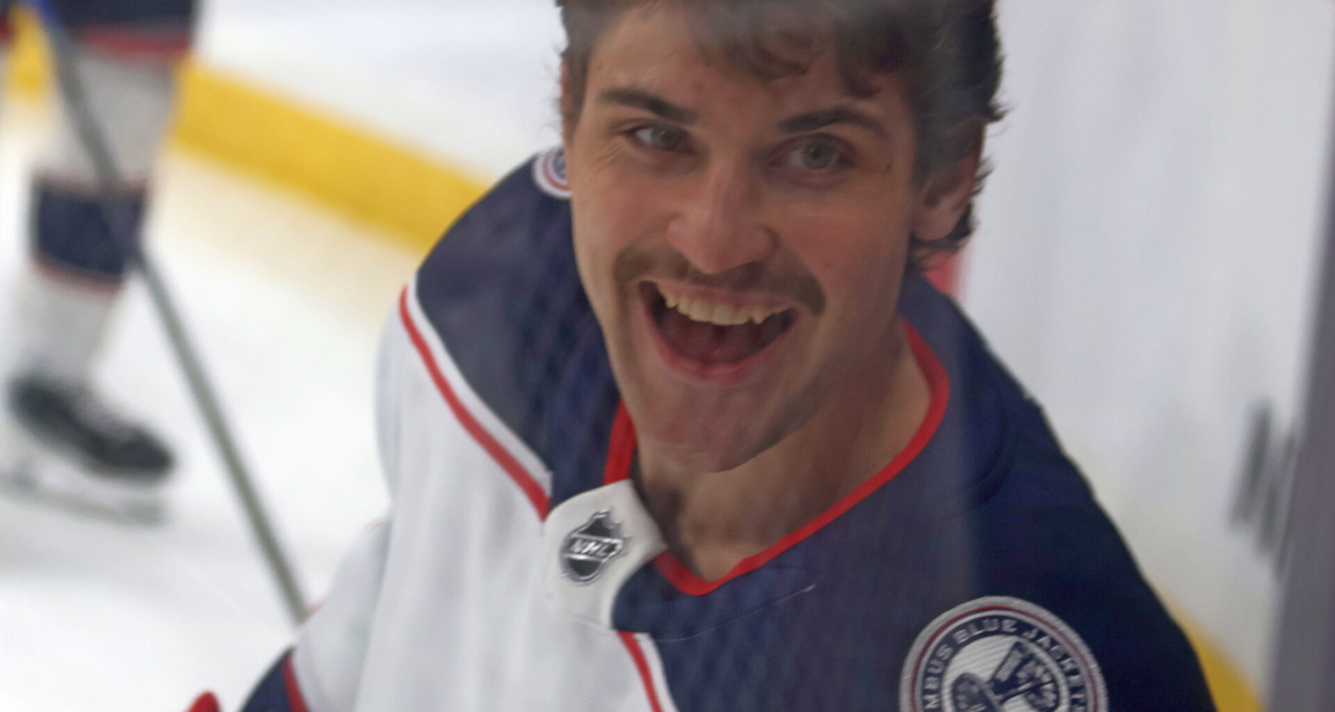 Denton Mateychuk flashes a smile to some of his fans during warm-ups for the Columbus/Winnipeg NHL game Nov. 18. (Cassidy Dankochik The Carillon)