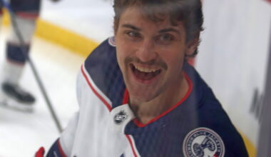 Denton Mateychuk flashes a smile to some of his fans during warm-ups for the Columbus/Winnipeg NHL game Nov. 18. (Cassidy Dankochik The Carillon)