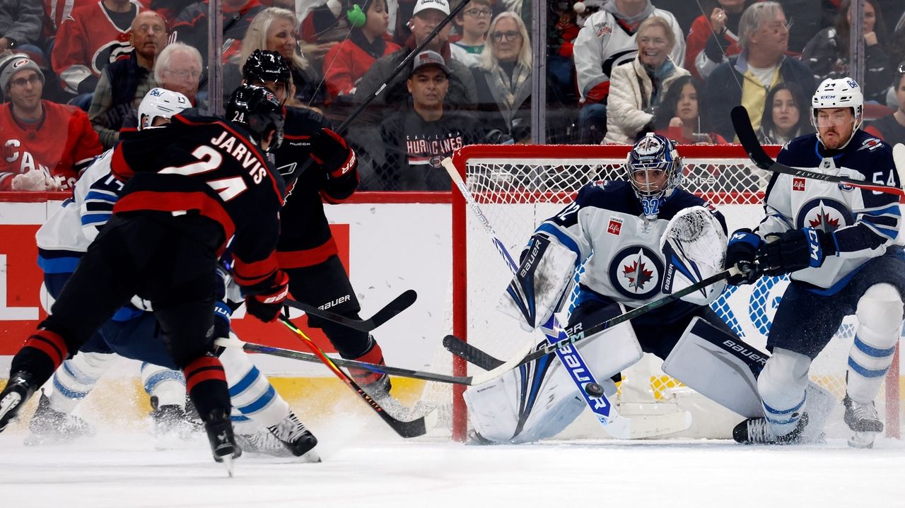 Jarvis scores a hat trick as Hurricanes pull away in third period to beat Jets 5-1