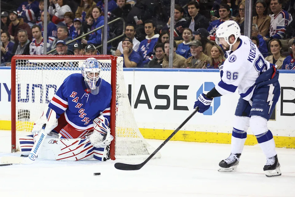 Apr 17, 2025; New York, New York, USA; New York Rangers goaltender Igor Shesterkin (31) makes a save on a shot on goal attempt by Tampa Bay Lightning right wing Nikita Kucherov (86) in the second period at Madison Square Garden. Mandatory Credit: Wendell Cruz-Imagn Images