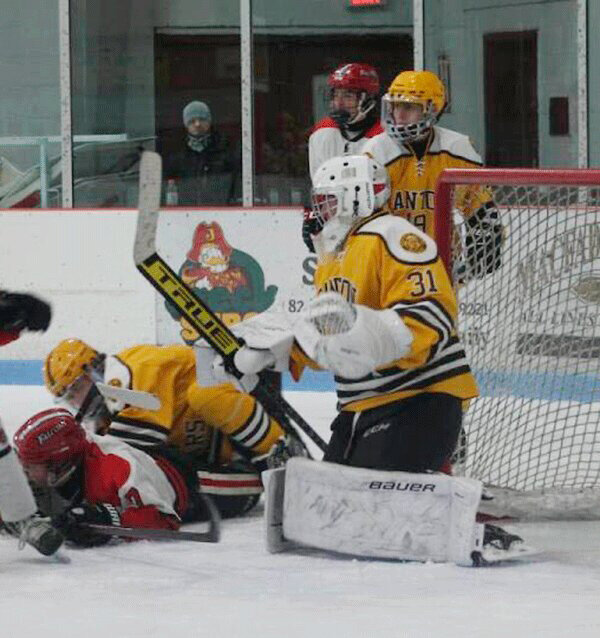 Canton Golden Bears goalie Daniel Creurer stands tall in the crease in boys varsity hockey action. Photo submitted by Canton Central School.