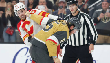 Calgary Flames right wing Adam Klapka (43) and Vegas Golden Knights defenseman Jeremy Lauzon (5 ...