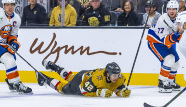 Golden Knights right wing Braeden Bowman (42) is taken down as he drives with the puck against ...