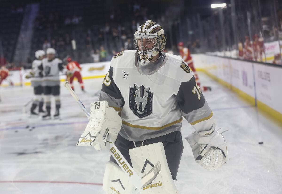 Silver Knights goaltender Carter Hart (79) warms up before an AHL hockey game against the Calga ...
