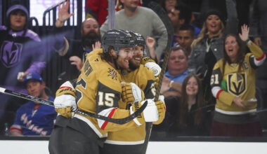 Golden Knights defenseman Noah Hanifin (15) celebrates his goal with defenseman Shea Theodore ( ...