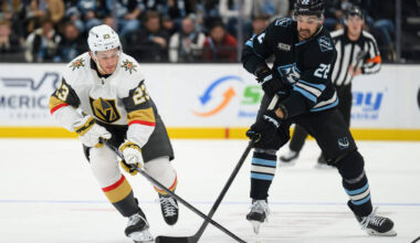 Vegas Golden Knights left wing Cole Reinhardt (23) and Utah Mammoth center Jack McBain (22) bat ...