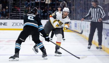 Vegas Golden Knights defenseman Noah Hanifin (15) passes the puck past Utah Mammoth defenseman ...