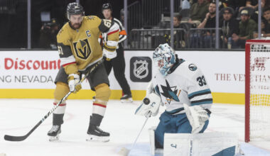 San Jose Sharks goaltender Alex Nedeljkovic (33) stops the puck as Golden Knights right wing Ma ...