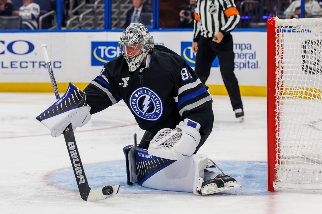 Tampa Bay Lightning goalie Andrei Vasilevskiy guarding the net during a game.