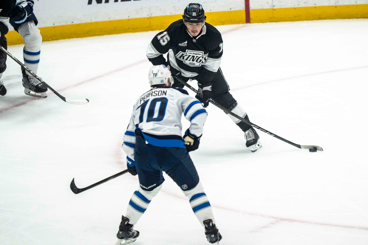Los Angeles Kings forward, Alex Turcotte (15) challenges an opponent during an NHL hockey game between the Winnipeg Jets and Los Angeles Kings, Tuesday November 4, 2025 in Los Angeles.