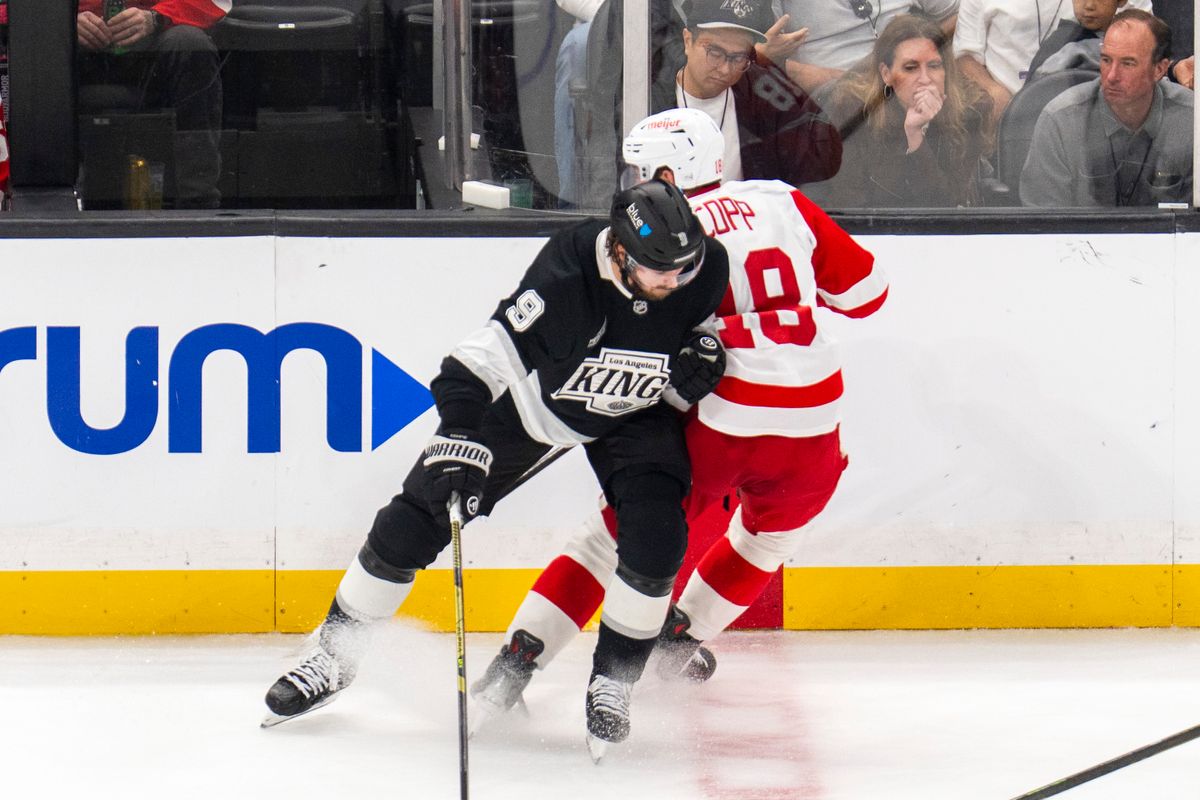 Los Angeles Kings RW Adrian Kempe (9) checks a Red Wings player during an NHL game against the Detroit Red Wings, Wednesday October 30th, 2025 in Los Angeles, California. 