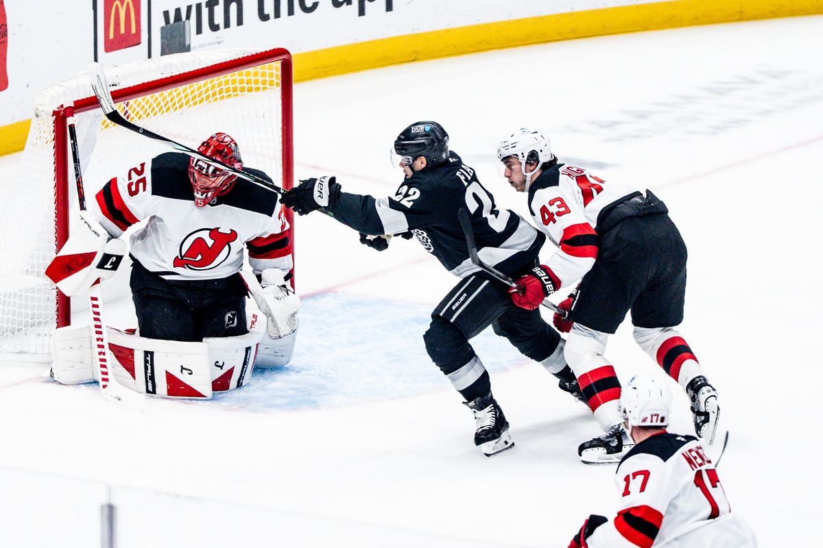 Los Angeles Kings LW Kevin Fiala (22) gets shoved in the back during an NHL game against the New Jersey Devils, Saturday November 1st, 2025 in Los Angeles, California. 