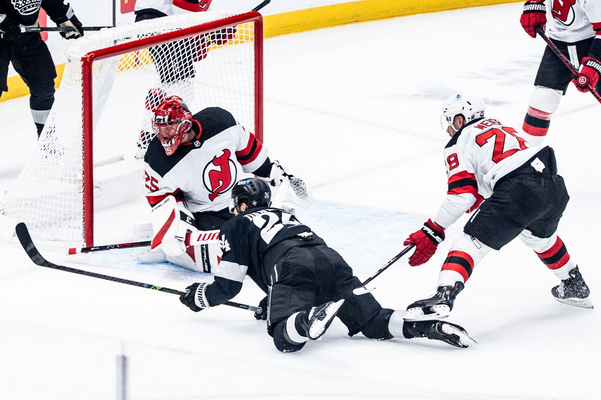 Los Angeles Kings C Phillip Danault (24) takes a shot at goal while falling during an NHL game against the New Jersey Devils, Saturday November 1st, 2025 in Los Angeles, California. 