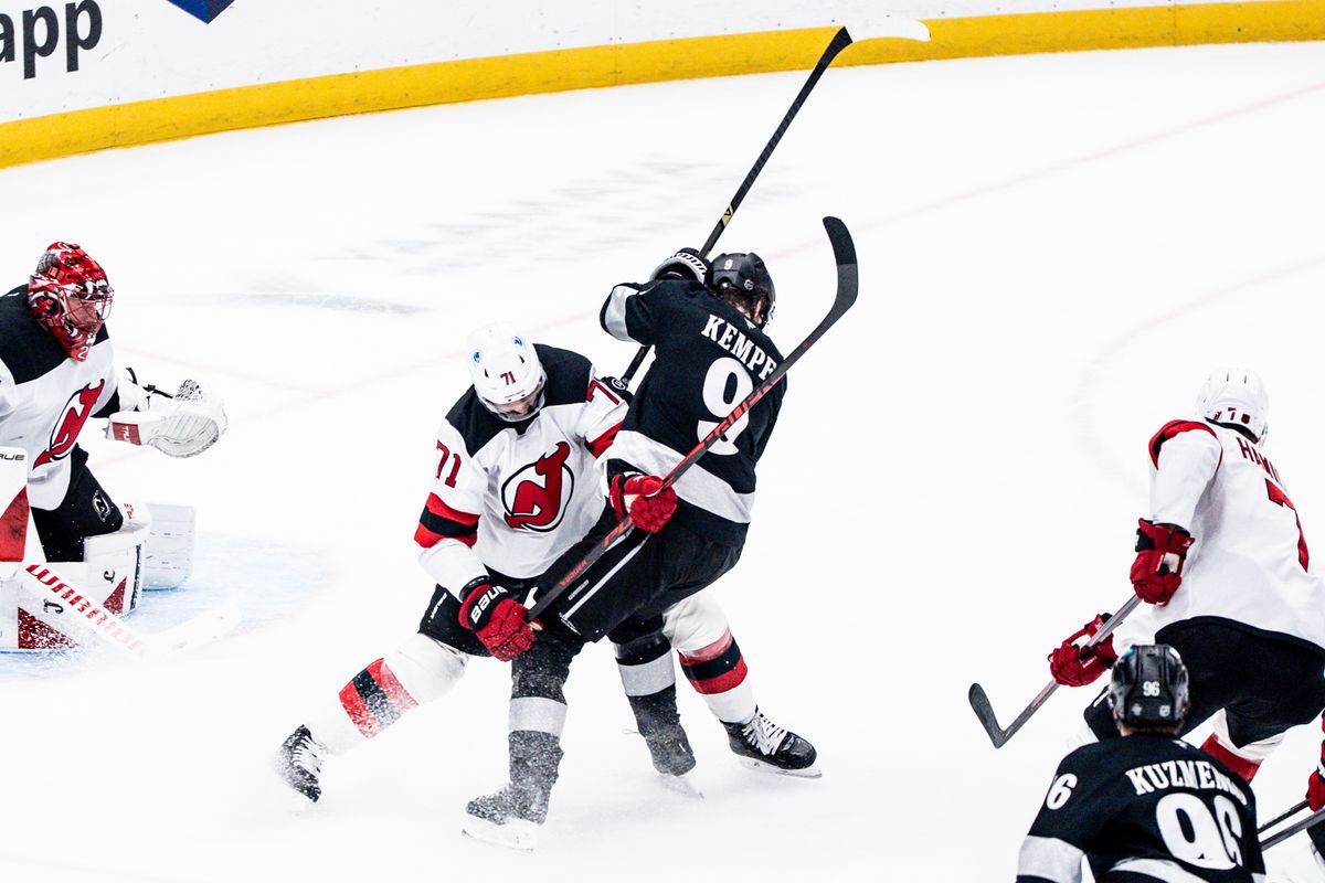 Los Angeles Kings RW Adrian Kempe (9) gets tangled up with the defender during an NHL game against the New Jersey Devils, Saturday November 1st, 2025 in Los Angeles, California. 
