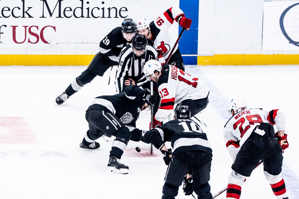 Los Angeles Kings players and Devils player has a face off during an NHL game against the New Jersey Devils, Saturday November 1st, 2025 in Los Angeles, California. 