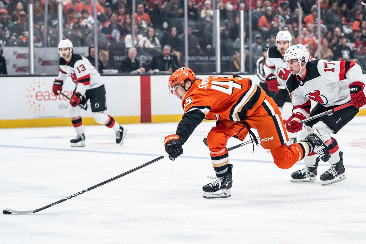 Anaheim Ducks RW Beckett Sennecke (45) reaches out for the puck on his way to try to score during an NHL game against the New Jersey Devils on Sunday November 2, 2025 in Anaheim, California.