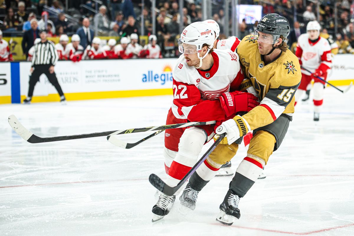 Vegas Golden Knights D Noah Hanifin (15) defended by Detroit Red Wings C Mason Appleton (22) during an NHL game on Tuesday November 4, 2025, in Las Vegas, Nevada. 