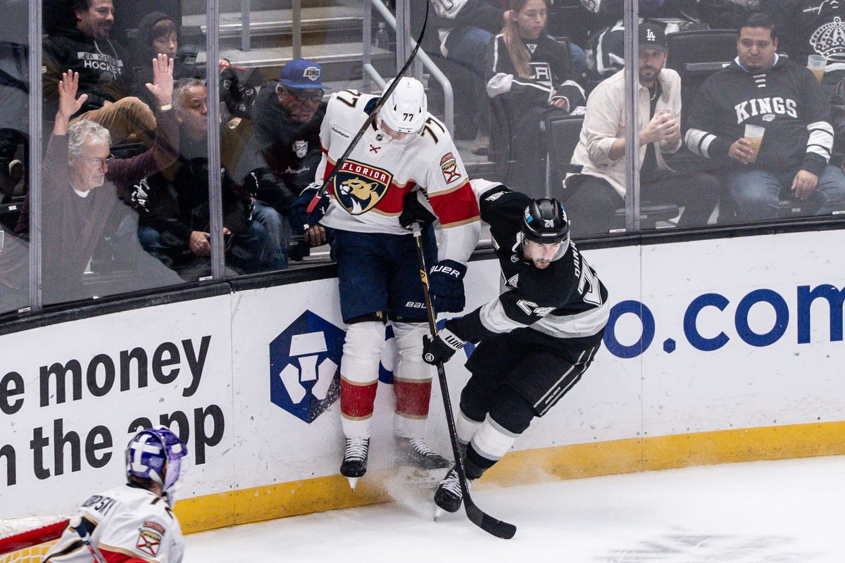 Los Angeles Kings Center Phillip Danault (24) attacks his opponent into the glass during an NHL hockey game against the Florida Panthers, Thursday November 6, 2025 in Los Angeles. Los Angeles Kings Center Phillip Danault (24) attacks his opponent into the glass during an NHL hockey game against the Florida Panthers, Thursday November 6, 2025 in Los Angeles.