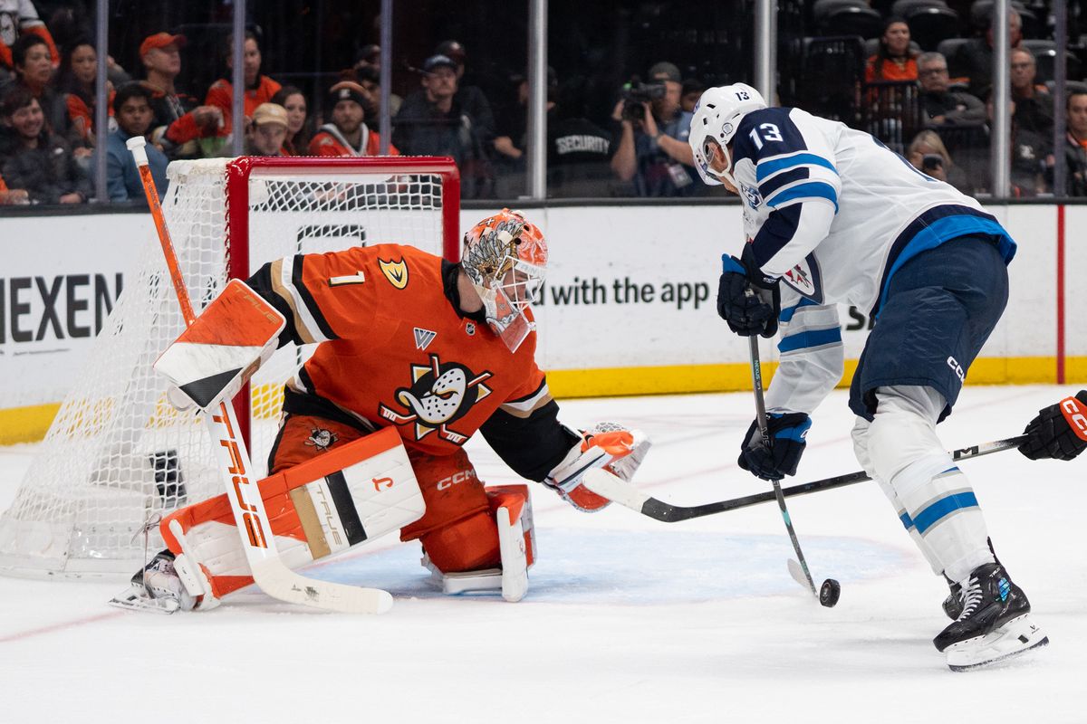 Anaheim Ducks Goalie Lukas Dostal (1) has an amazing stop on a goal attempt during an NHL hockey game against the Winnipeg Jets, Sunday November 9, 2025 in Anaheim, Calif.