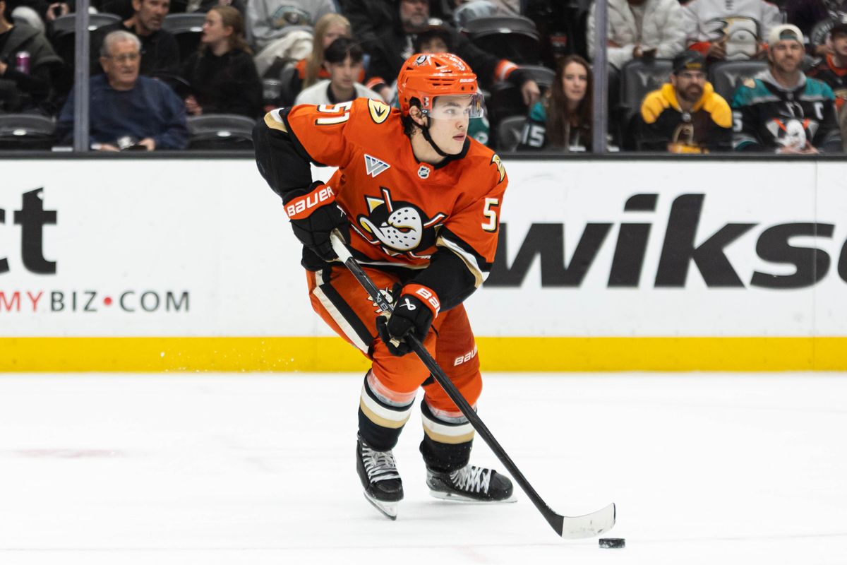 Anaheim Ducks D Olen Zellweger (51) looks to pass the puck during an NHL game against the Boston Bruins on November 19, 2025 in Anaheim, Calif. Anaheim Ducks D Olen Zellweger (51) looks to pass the puck during an NHL game against the Boston Bruins on November 19, 2025 in Anaheim, Calif.