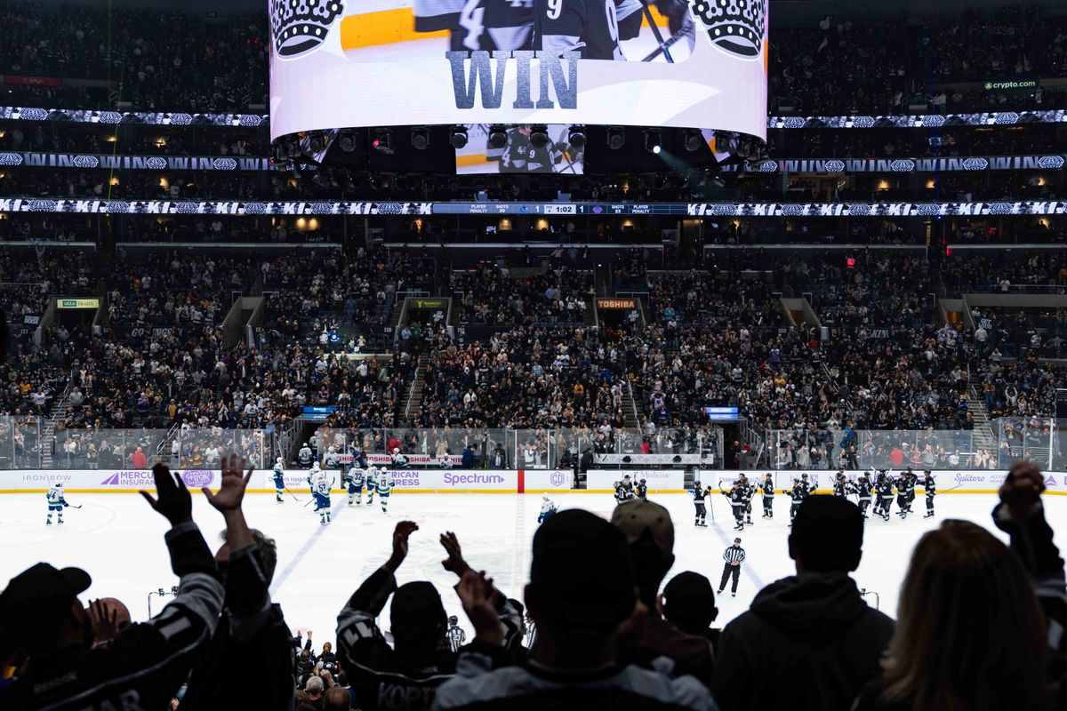 Kings fans celebrate a win during an NHL game between the Vancouver Canucks and the Los Angeles Kings, Saturday November 29, 2025 at Crypto.com Arena in Los Angeles, Calif.