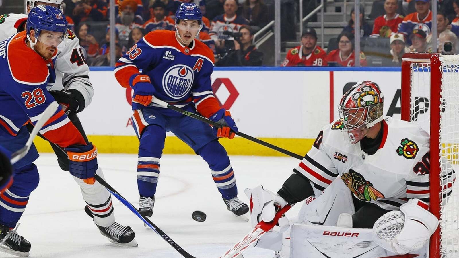 Evan Bouchard's OT goal pushes Oilers past Blackhawks