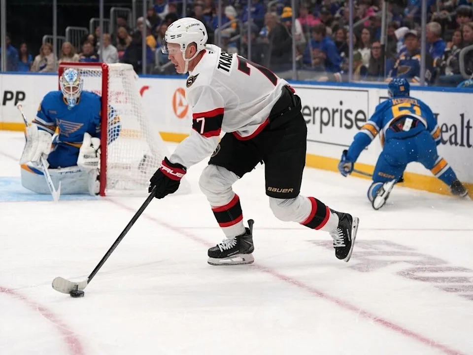  Senators captain Brady Tkachuk (7) stickhandles the puck in front of Blues netminder Jordan Binnington in the first period. In his first game since thumb surgery six weeks earlier, Tkachuk had six shots on net.