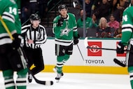 Dallas Stars left wing Jason Robertson (21) reacts after assisting on a goal by center Roope...
