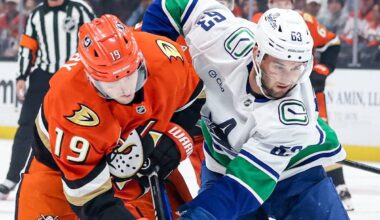 Vancouver Canucks forward Max Sasson, right, battles with Anaheim Ducks forward Troy Terry during NHL action Wednesday, Nov. 26, 2025 at the Honda Center in Anaheim, Calif. (https://x.com/Canucks photo)